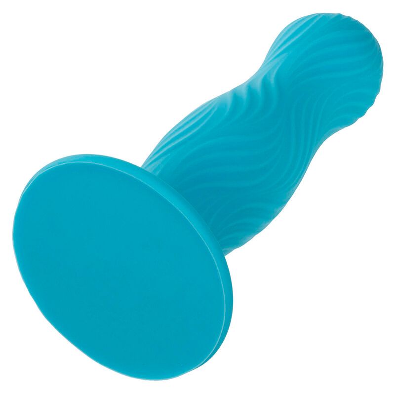 Türkisfarbener Analplug, wellenförmige Textur, schräge Ansicht. Basis mit breitem Rand.