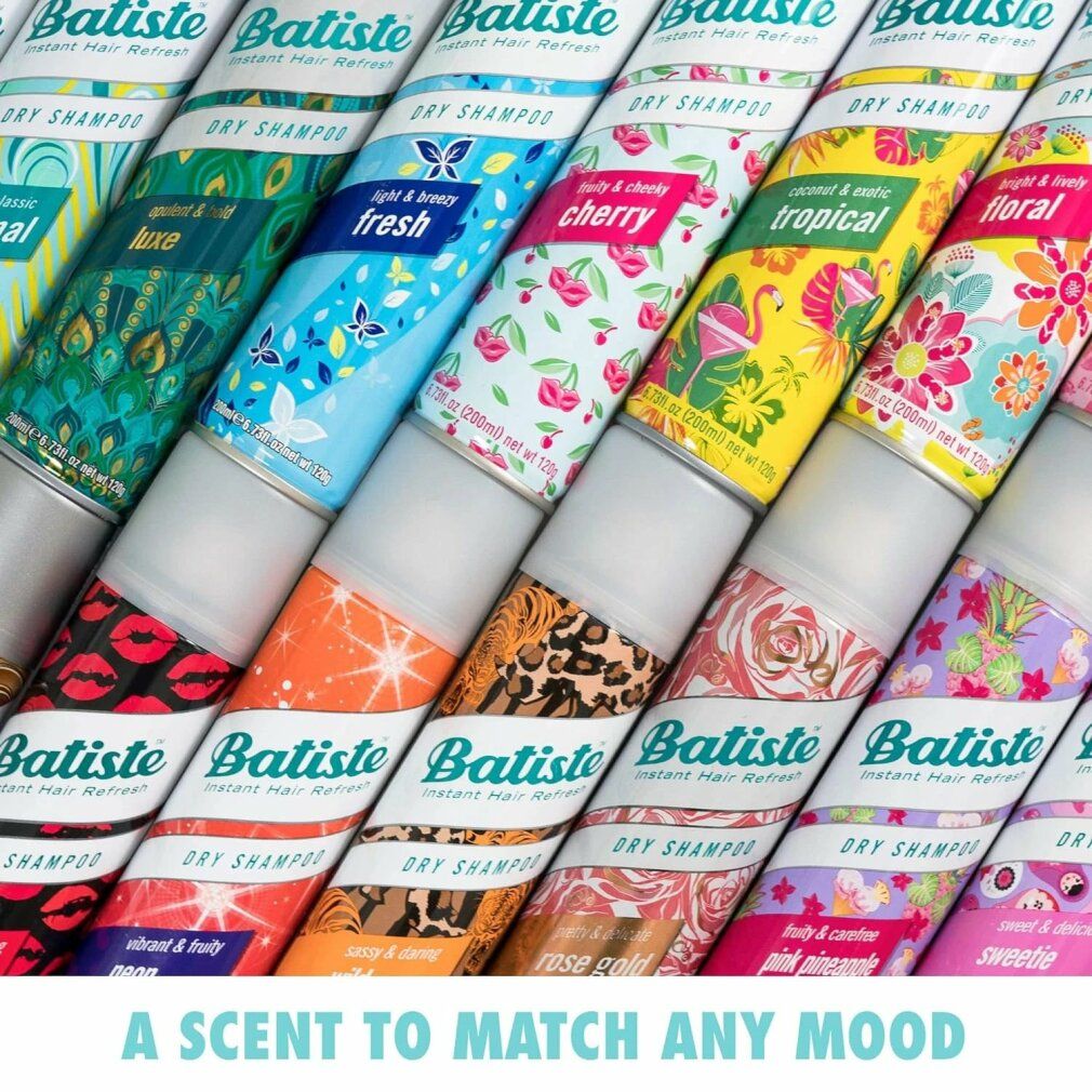 Reihe von Batiste Trockenshampoo-Dosen mit verschiedenen Designs. Text: A scent to match any mood.
