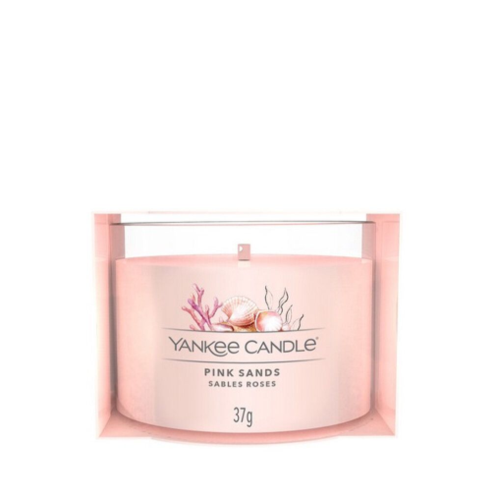 Rosa Yankee Candle im Glas. Aufschrift: Pink Sands, 37g. Abbildung von Muscheln und Korallen.