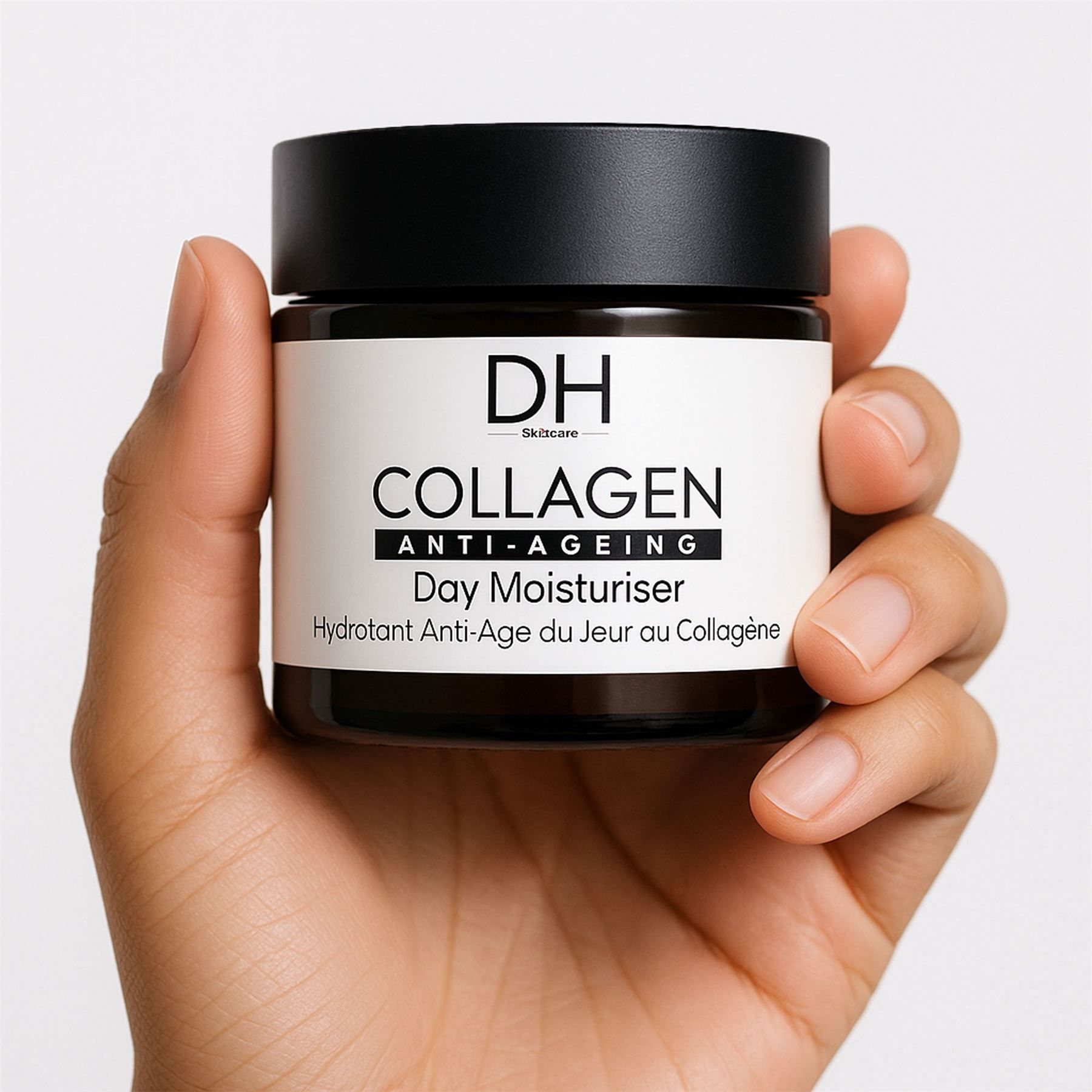 Hand hält Dr H Collagen Anti-Age Tagescreme.