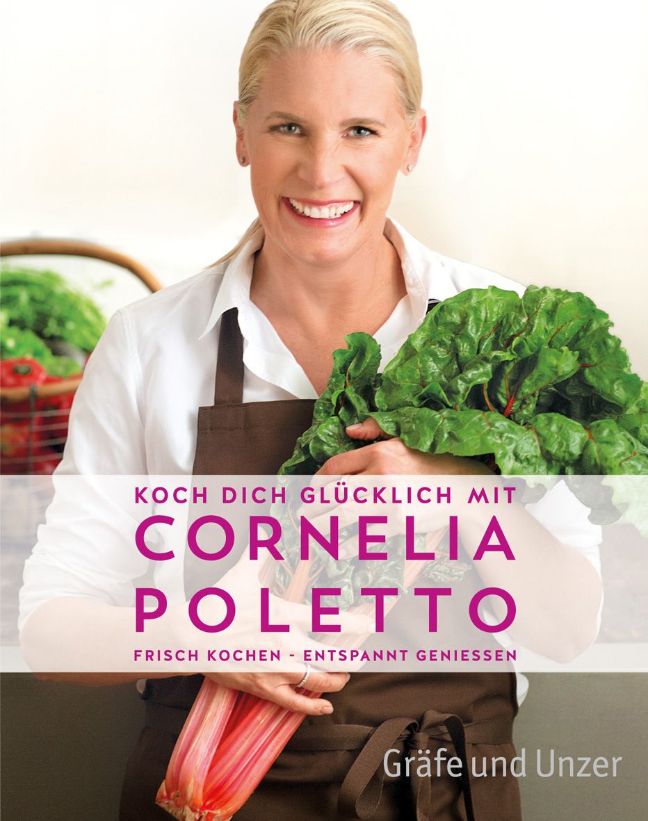Buchcover mit Cornelia Poletto. Titel: Koch dich glücklich. Frau hält Gemüse. Braune Schürze, weißes Hemd.