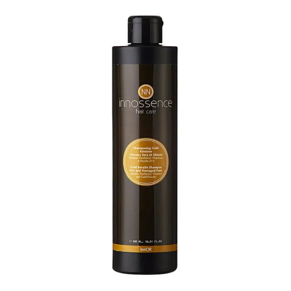 Braune Flasche mit schwarzem Deckel. Etikett mit Produktinformationen und Logo. Gold Keratin Shampoo für trockenes und geschädigtes Haar.