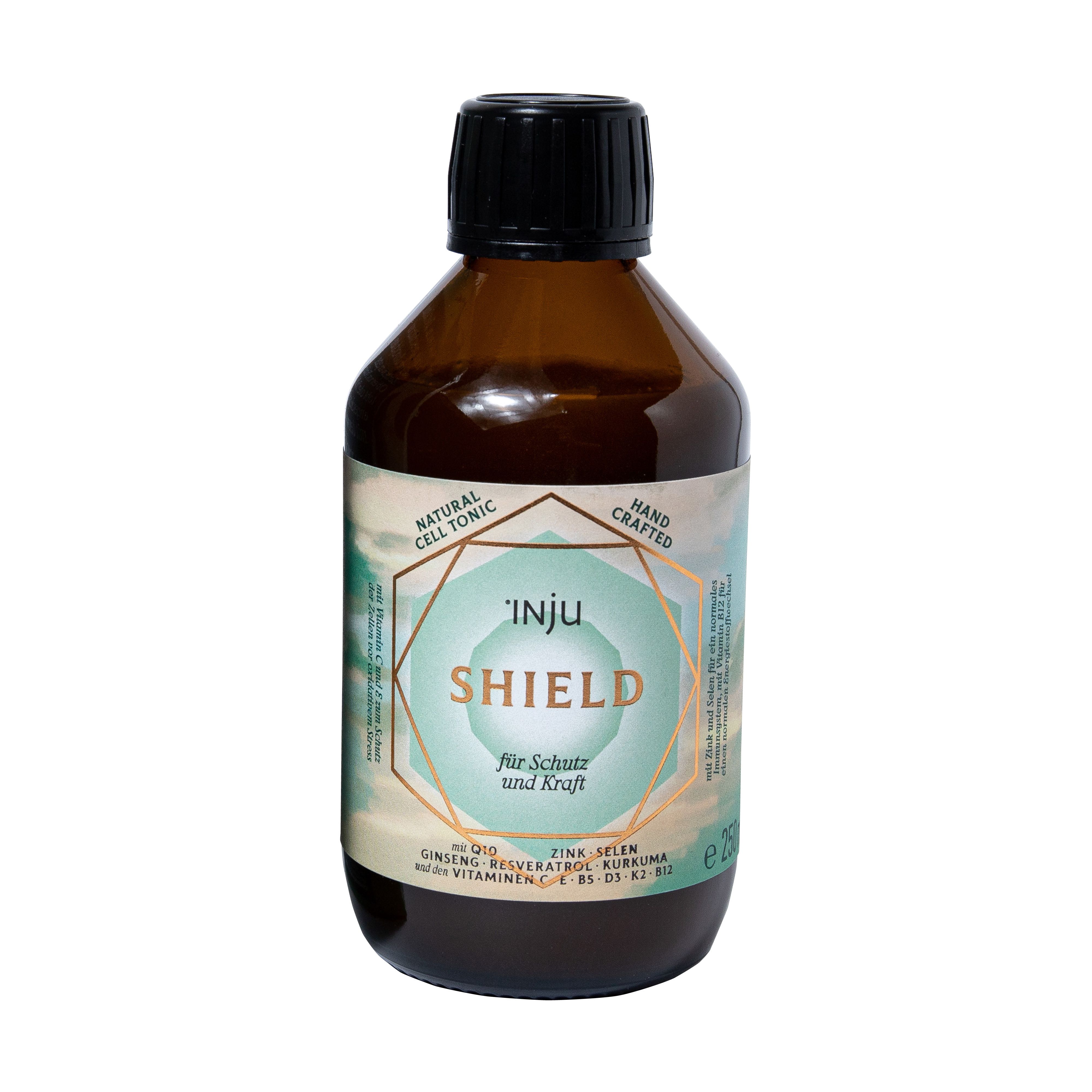 Braune Glasflasche mit schwarzem Deckel. Etikett mit 'INJU SHIELD' und Inhaltsstoffen. 'Natural Cell Tonic' und 'Hand Crafted'.