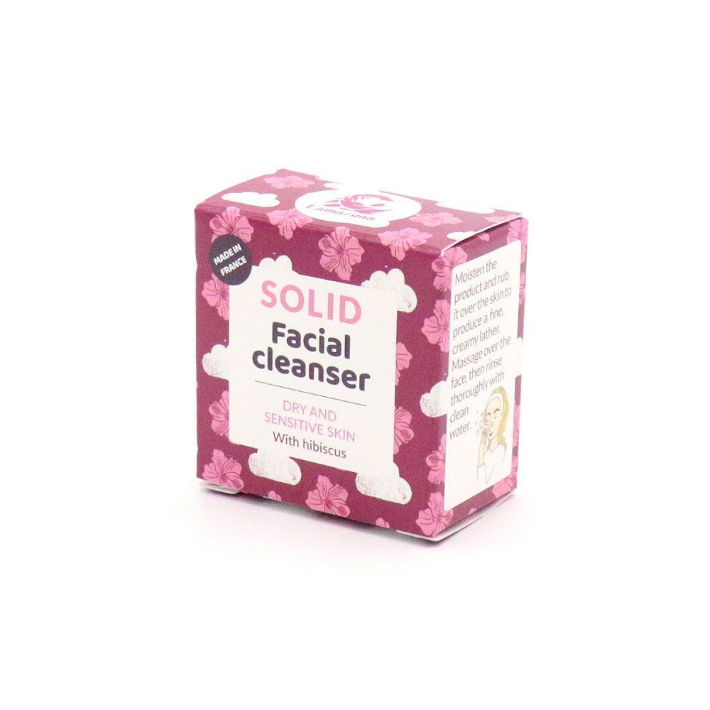 Verpackung für festes Gesichtsreinigungsmittel. Floral gemustert, Text: "Solid Facial Cleanser".