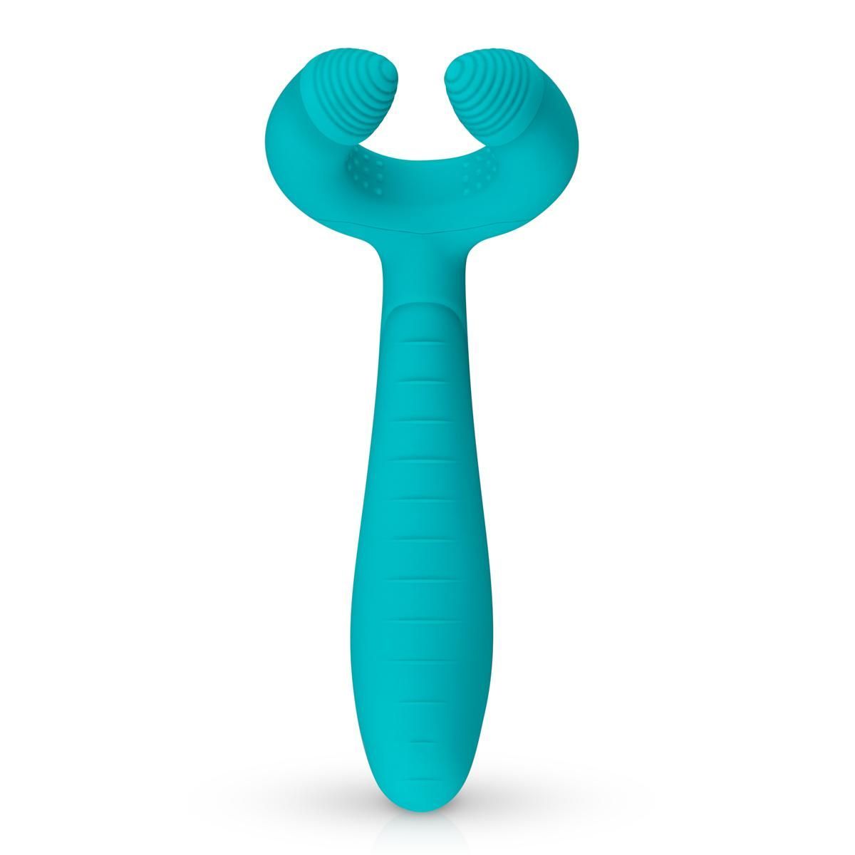 Produit de bien-être turquoise. En forme de U avec surface rainurée aux extrémités. Manche allongé avec rainures.