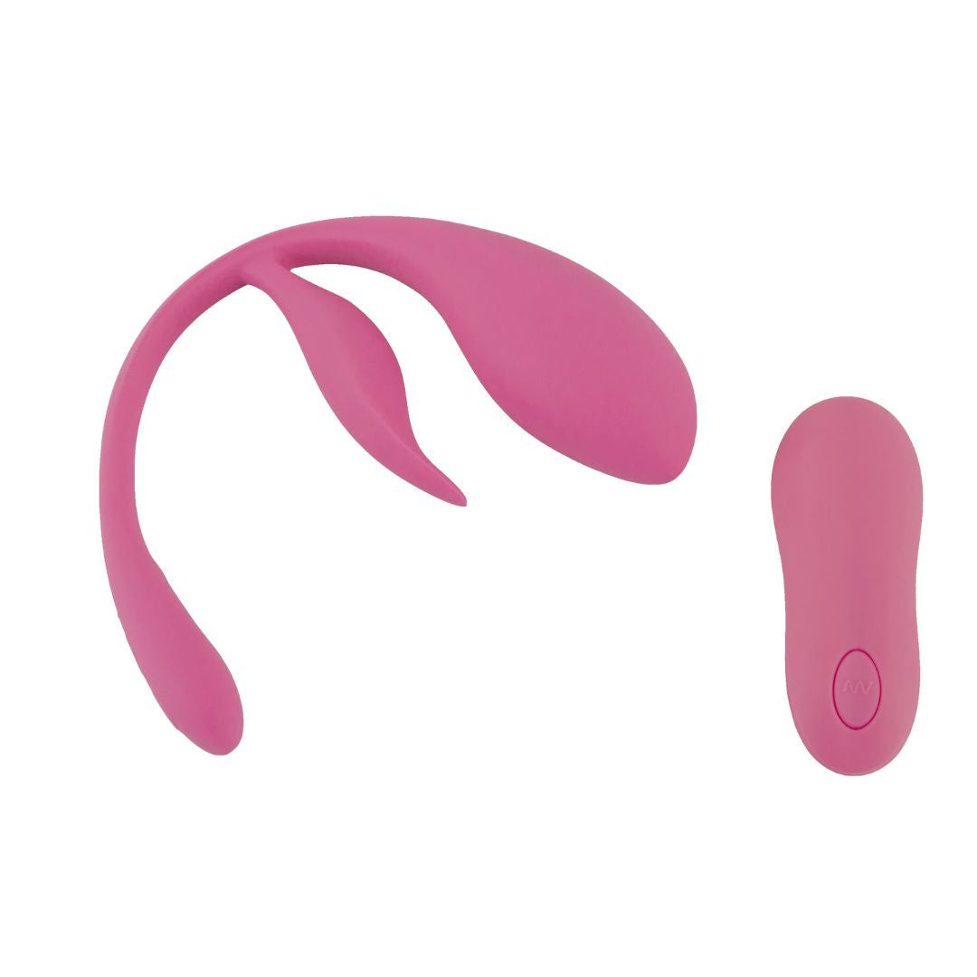 Rosa Vibrator mit zwei Enden und Fernbedienung. Das Produkt ist aus Silikon gefertigt.