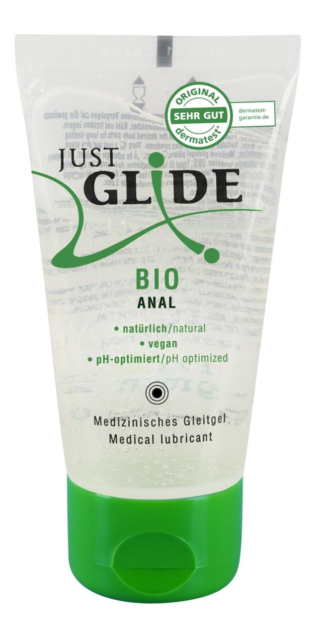 Transparente Tube mit grünem Verschluss. Aufschrift: Just Glide Bio Anal, pH-optimiert, vegan. Medizinische Gleitmittel. Dermatest.