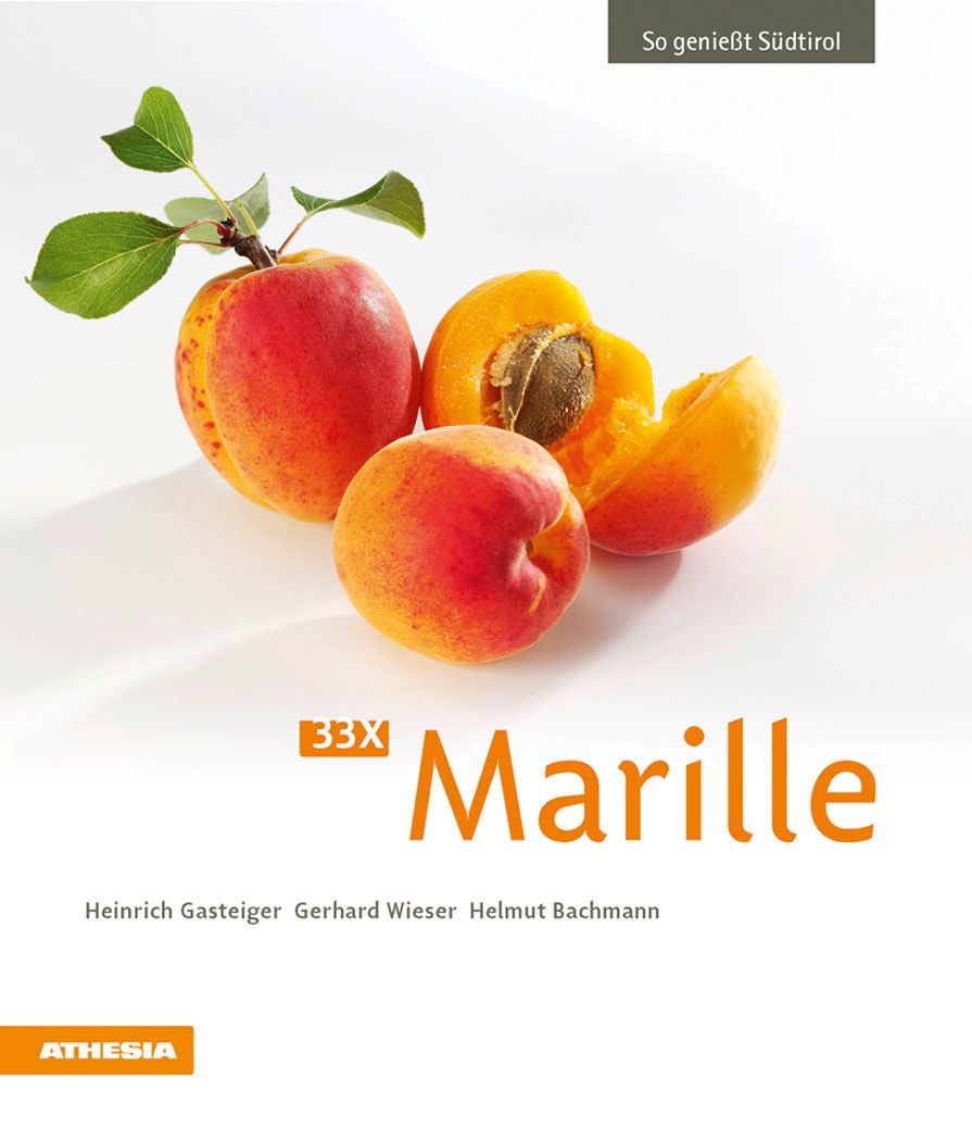 Drei Aprikosen, eine angeschnitten, mit Blättern. Titel: 33X Marille. Autoren: Heinrich Gasteiger, Gerhard Wieser, Helmut Bachmann. Verlag: Athesia.