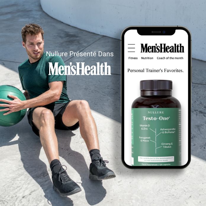 Mann mit Medizinball und Smartphone mit Nullure Testo-One Flasche.