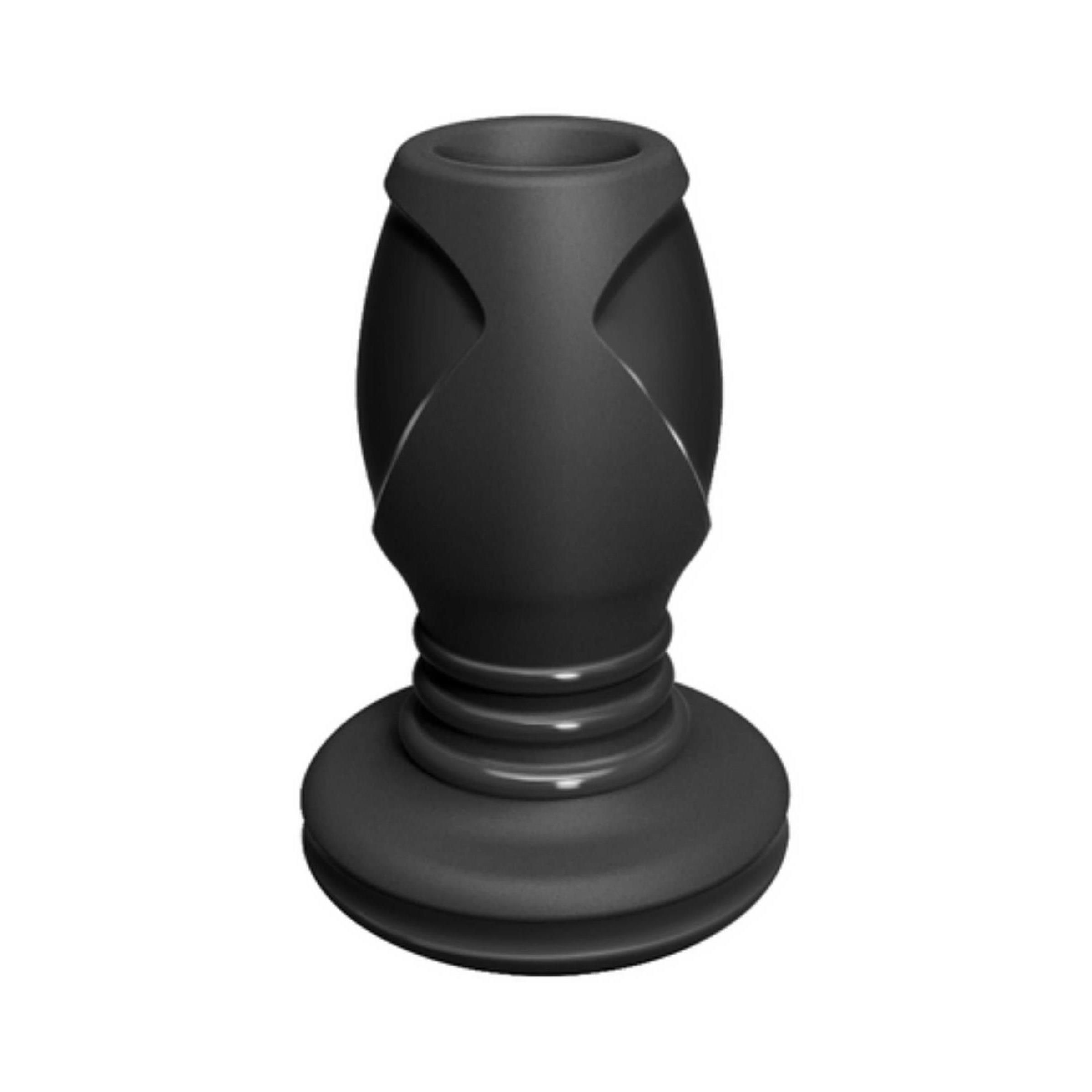 Schwarzer Butt Plug. Zylindrische Form mit erhabenen Details. Runde Basis. Aus Silikon.