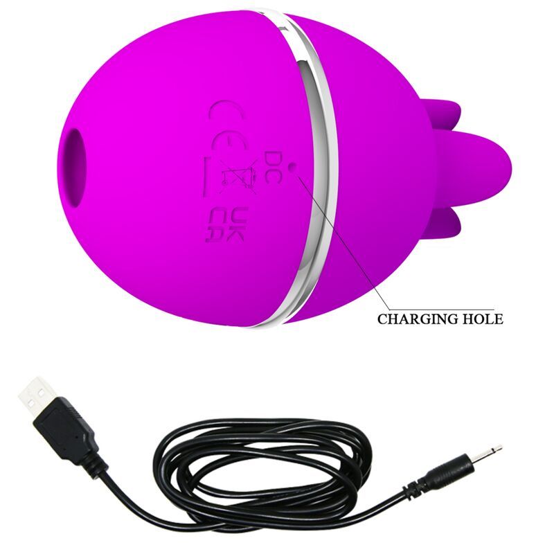 Pinkfarbener Kugelvibrator mit Ladeanschluss. Schwarzes Ladekabel mit USB- und Klinkenstecker.