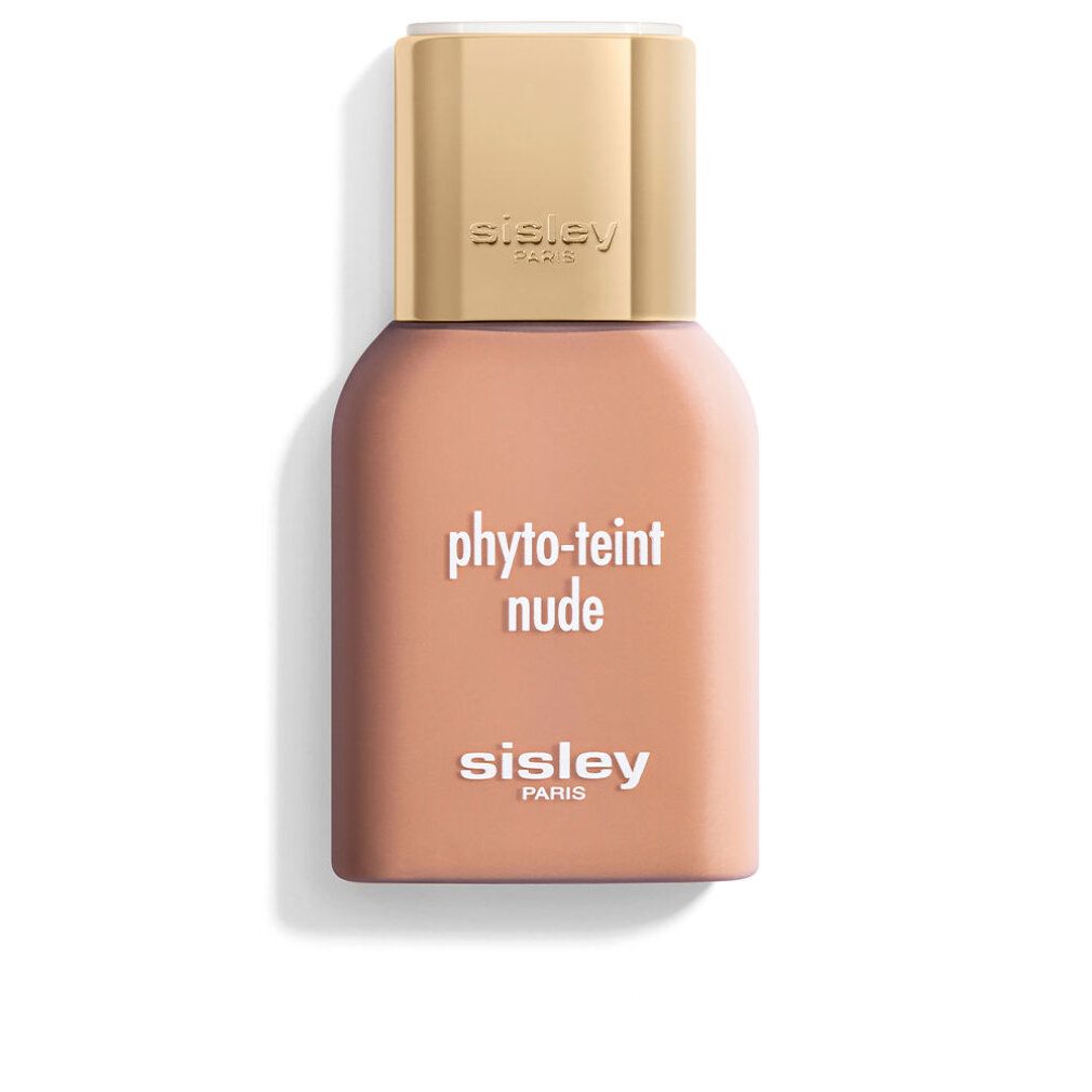 Sisley Phyto-Teint Nude Flasche. Beige Farbton, goldfarbener Deckel. Aufschrift: Phyto-Teint Nude, Sisley Paris.