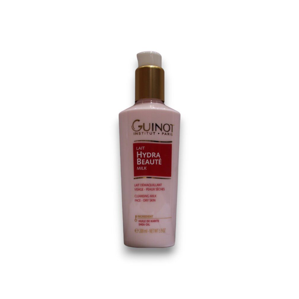 Rosa Flasche mit goldfarbenem Deckel. Aufschrift: Guinot, Lait Hydra Beauté, Cleansing Milk. Für trockene Haut.