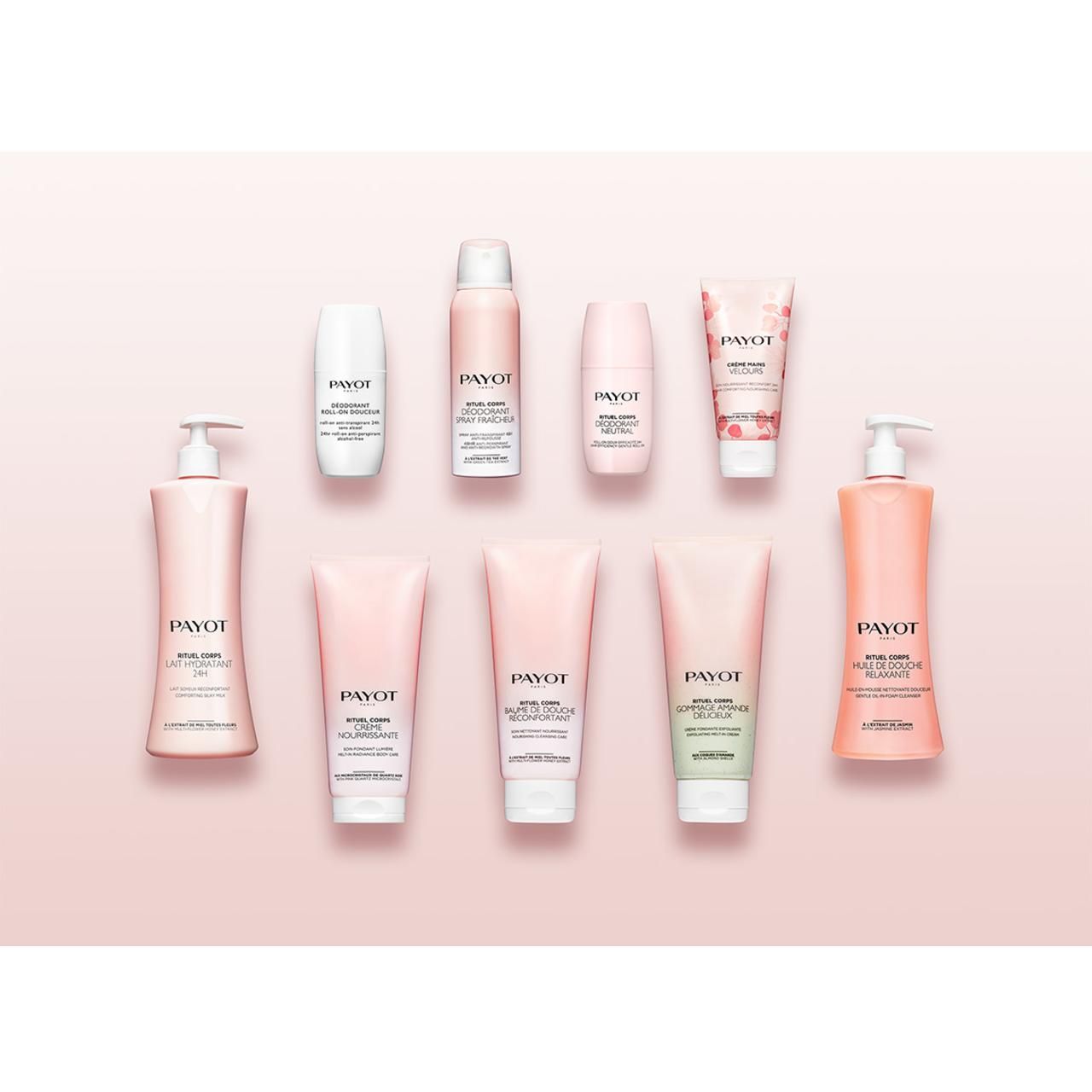 Anordnung verschiedener Payot-Körperpflegeprodukte auf rosa Hintergrund. Verschiedene Formen und Größen, darunter Tuben, Flaschen und Sprays.