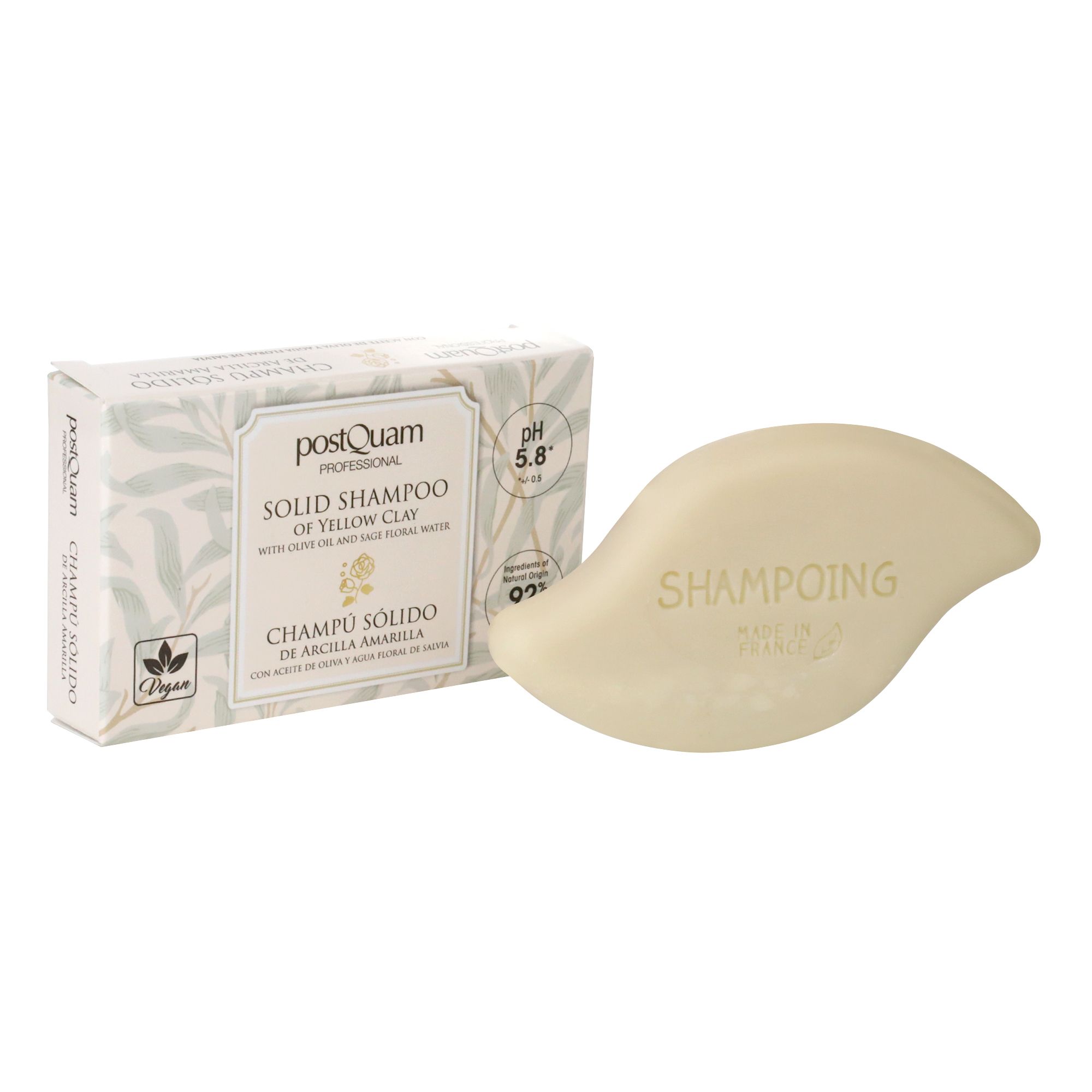 Festes Shampoo mit gelbem Ton und Verpackung. Aufschrift: Postquam, Champú Sólido, pH 5.8, vegan.