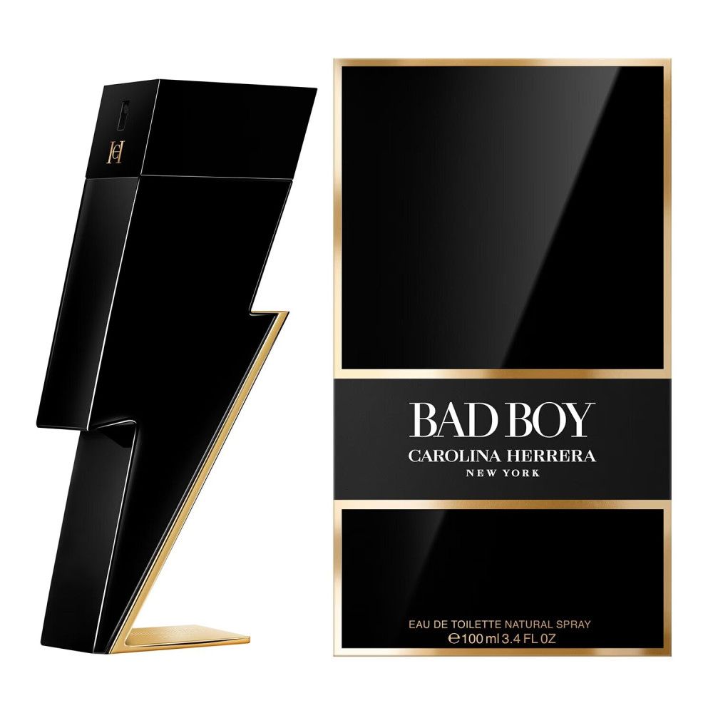 Schwarzer Flakon in Blitzform mit goldfarbenen Akzenten und Verpackung. Aufschrift: BAD BOY CAROLINA HERRERA NEW YORK.