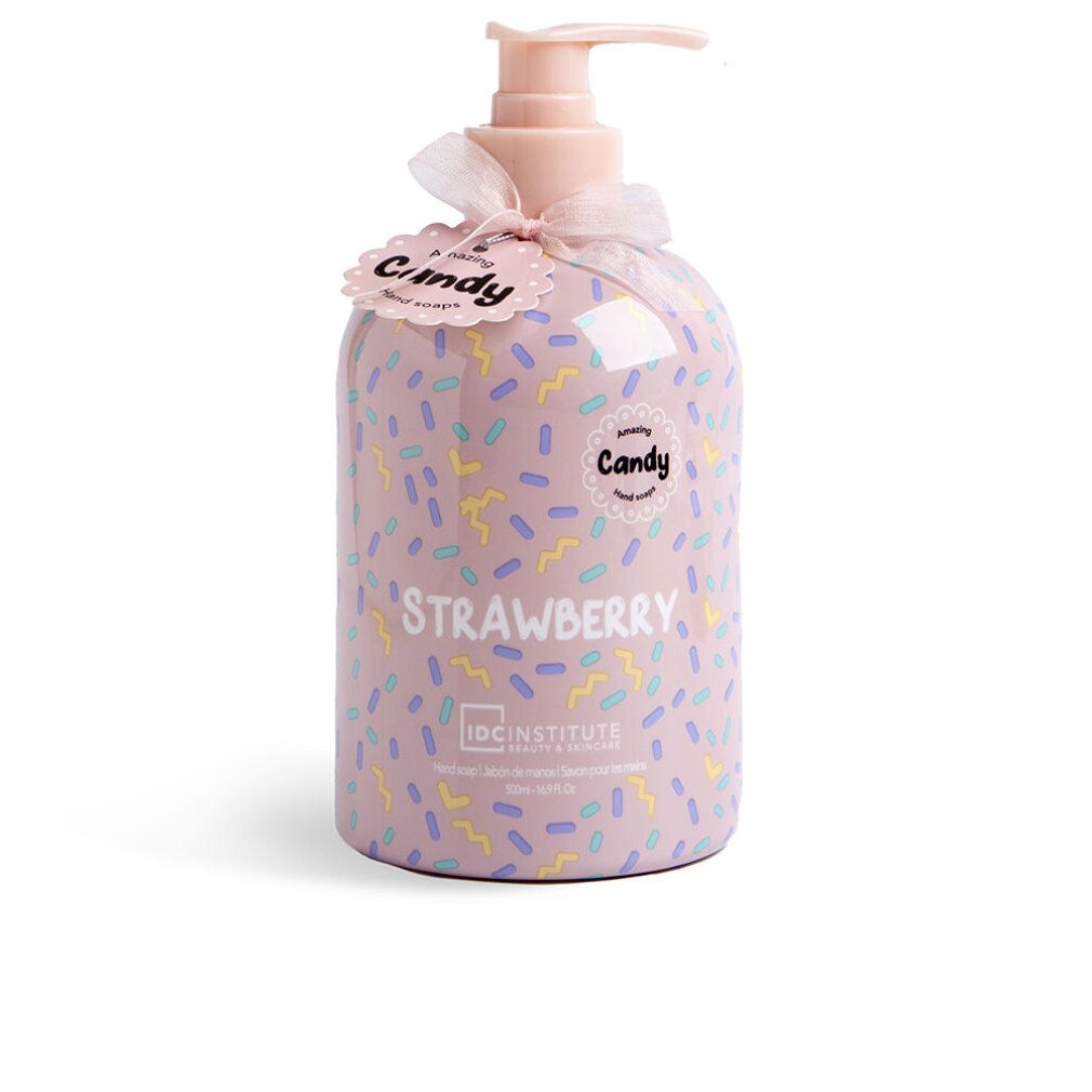Rosa Seifenflasche mit Streuselmuster. Aufschrift "Strawberry" und "Candy". Marke: IDC INSTITUTE.