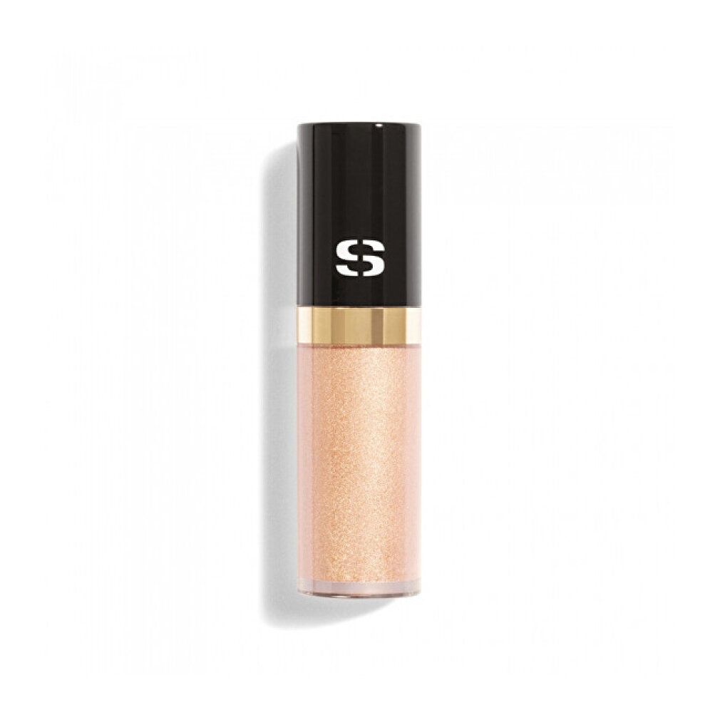 Sisley Ombre Eclat Liquide. Zylindrische Flasche mit schwarzem Deckel und goldenem Ring. Rosa-goldfarbene Flüssigkeit.