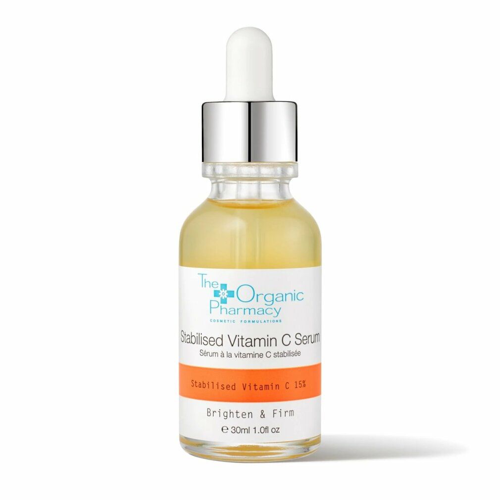 Serumflasche mit Pipette. Aufschrift: Stabilised Vitamin C Serum. Flasche mit gelbem Serum. Silberne Pipette.