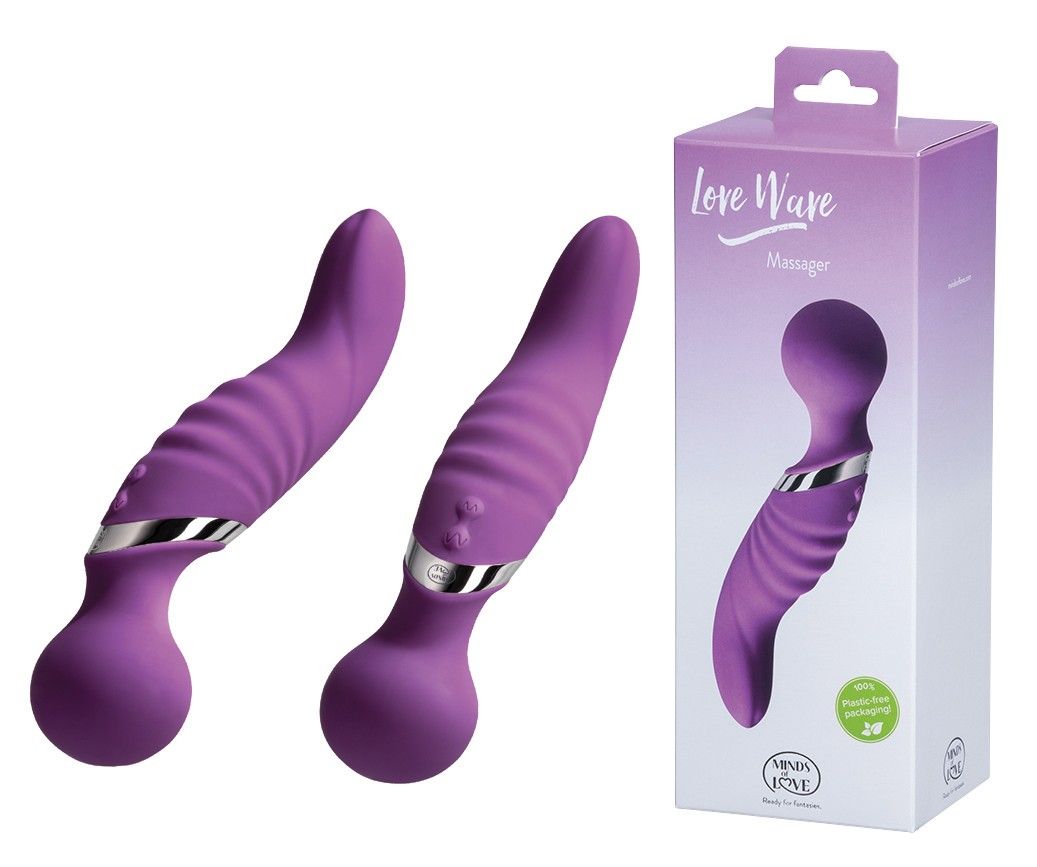 Zwei lila Massagegeräte neben einer Verpackung. Verpackung mit Produktabbildung und Schriftzug 'Love Wave Massager'.