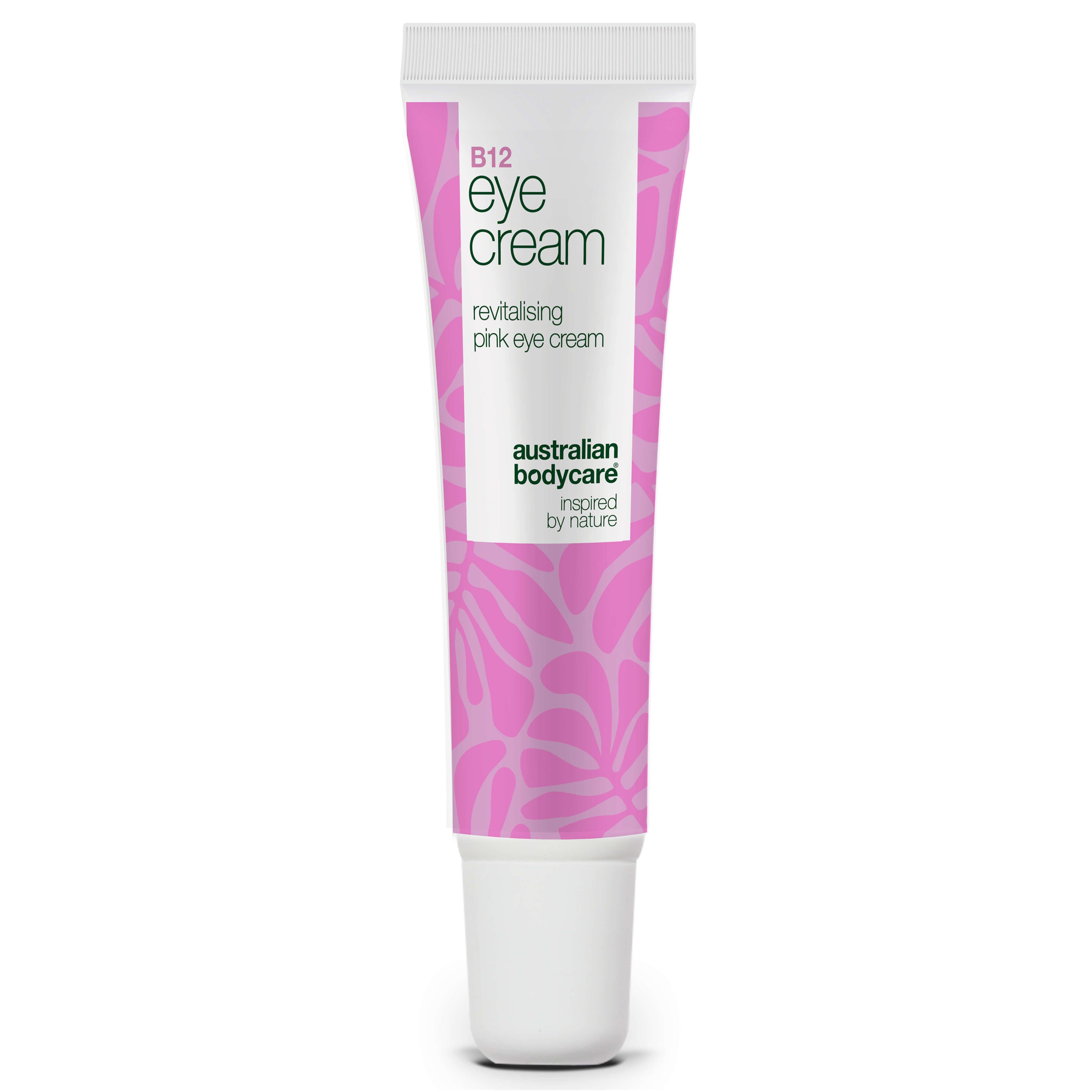 Tube de crème pour les yeux B12. Bouchon blanc, motif rose. Texte: B12 Eye Cream, revitalising pink eye cream, Australian Bodycare.