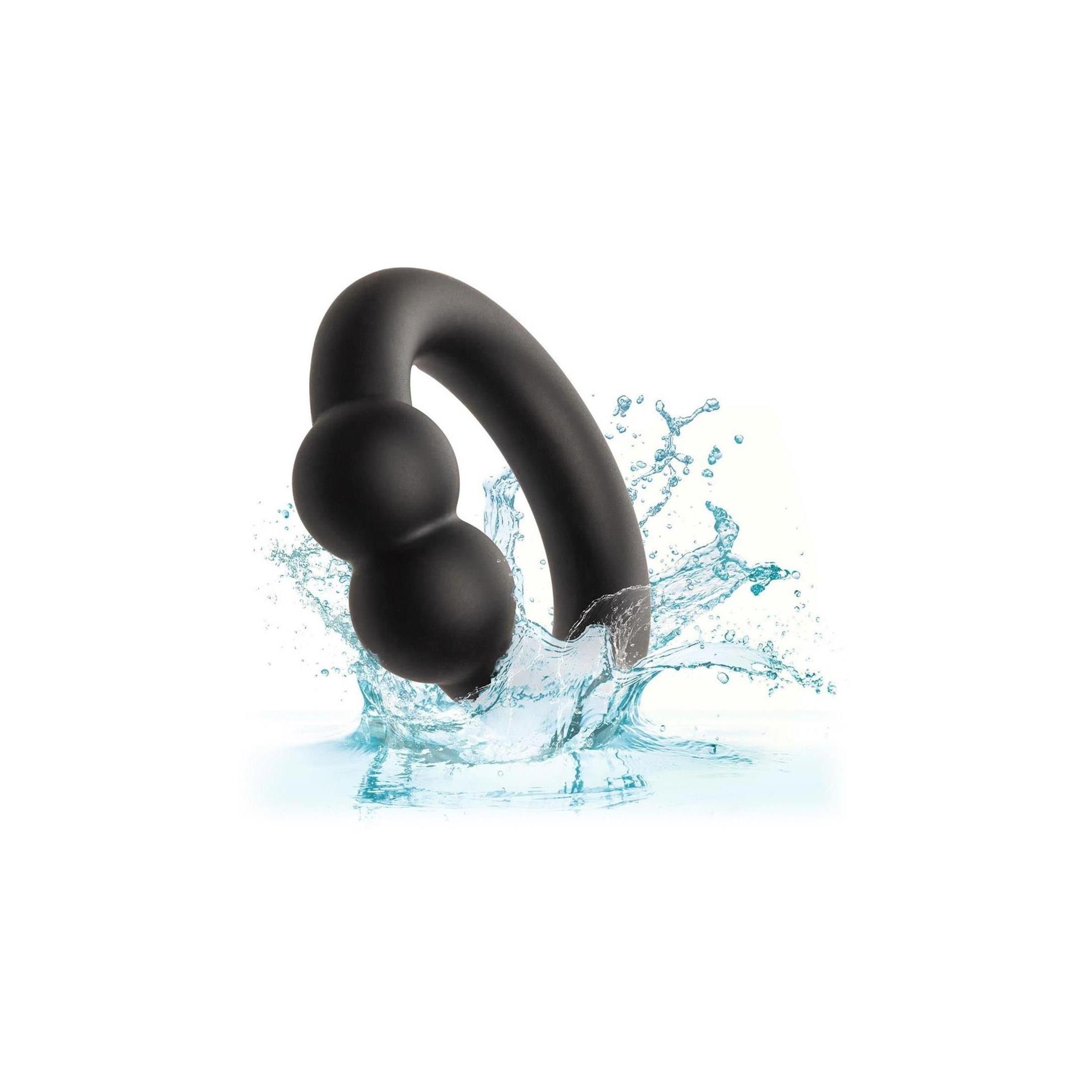 Schwarzer Ring mit zwei Kugeln im Wasser. Aus Silikon. Für Intimbereich.