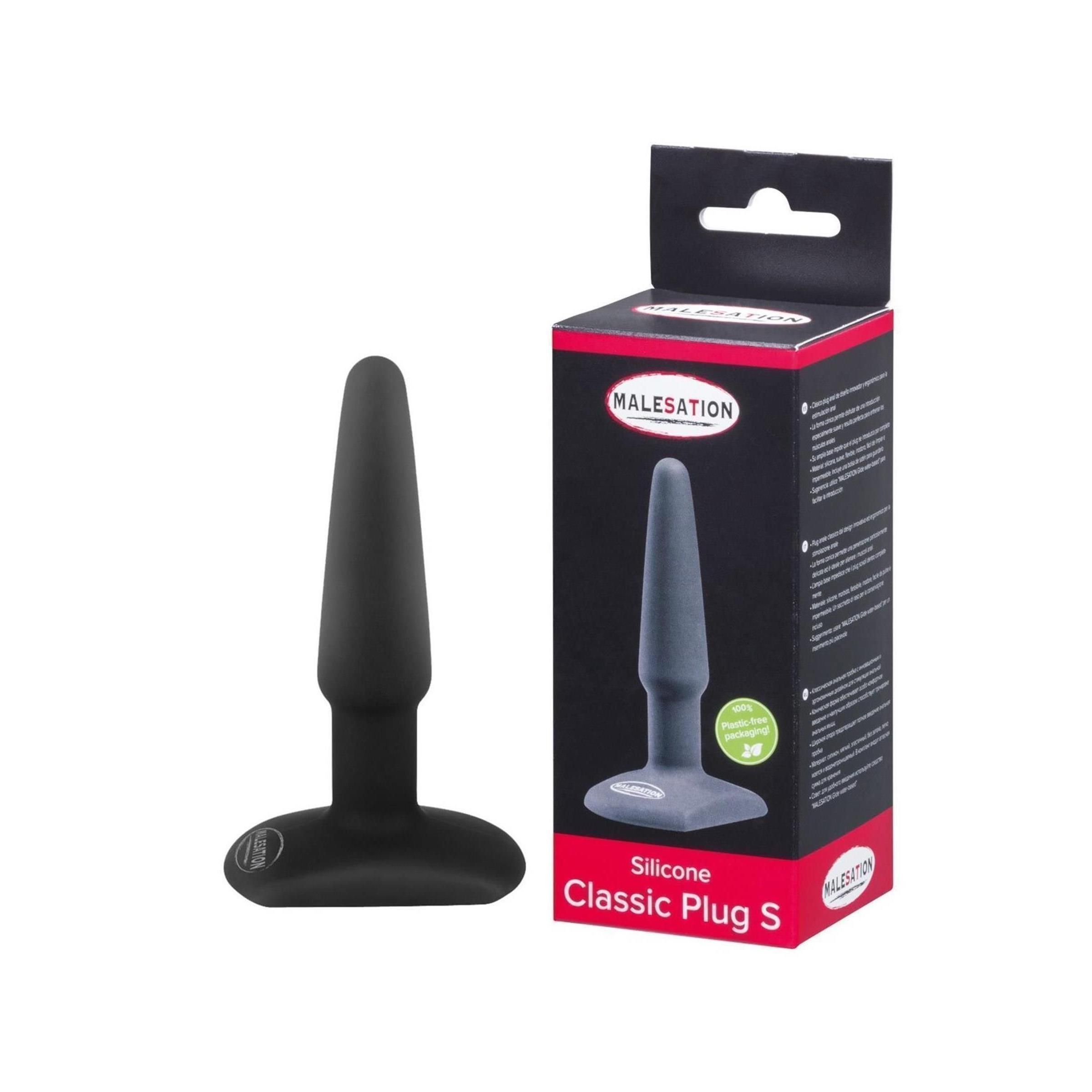 Schwarzer Silikon-Analplug mit breiter Basis. Neben der Verpackung mit Produktname und Logo.