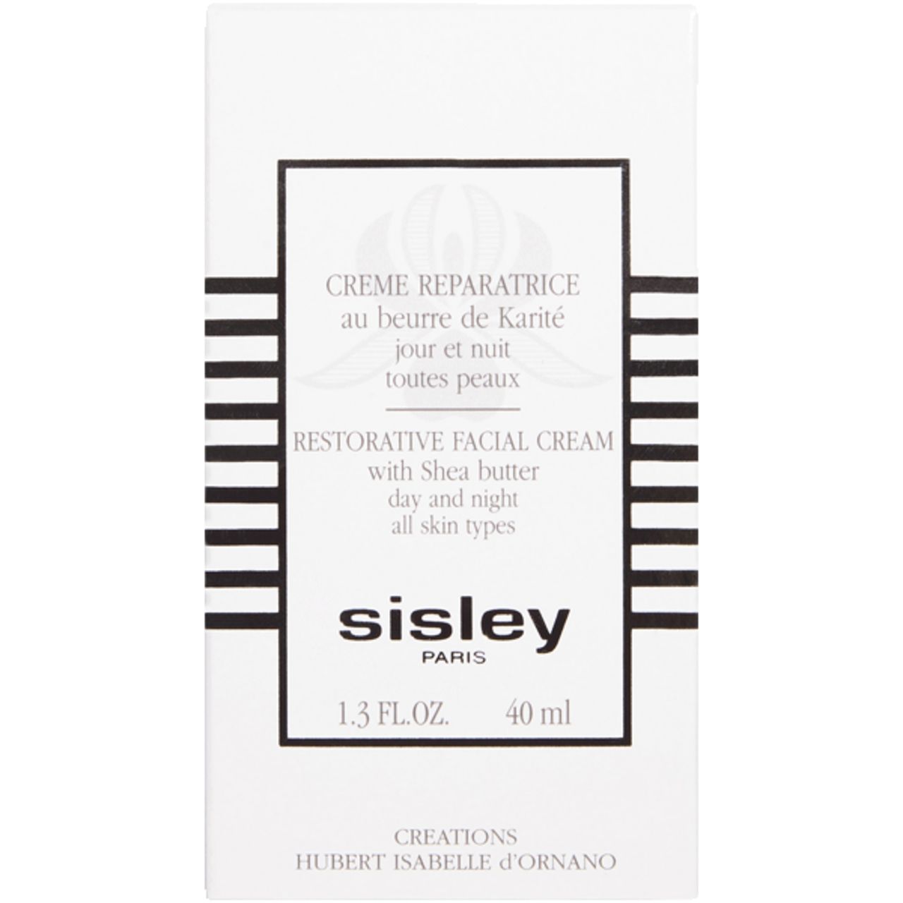 Weiße Verpackung Sisley Creme Reparatrice. Text: Creme Reparatrice, Restorative Facial Cream, Shea Butter, Tag und Nacht, alle Hauttypen. Logo Sisley.