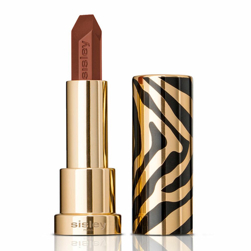 Goldfarbener Lippenstift mit brauner Mine. Der Deckel hat ein schwarz-goldenes Zebra-Muster. Auf dem Lippenstift steht "Sisley".