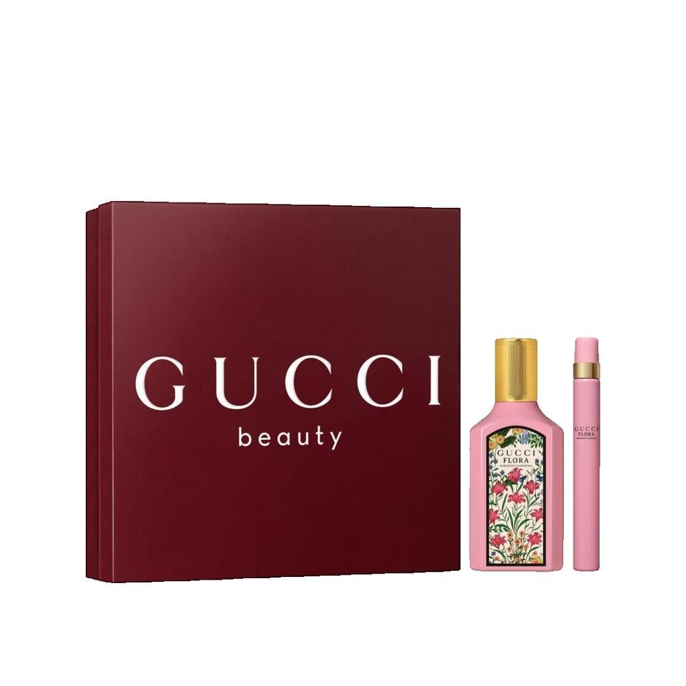 Geschenkset mit Gucci-Logo und Beauty-Schriftzug. Enthält eine pinkfarbene Flasche und einen Zerstäuber. Rote Verpackung.