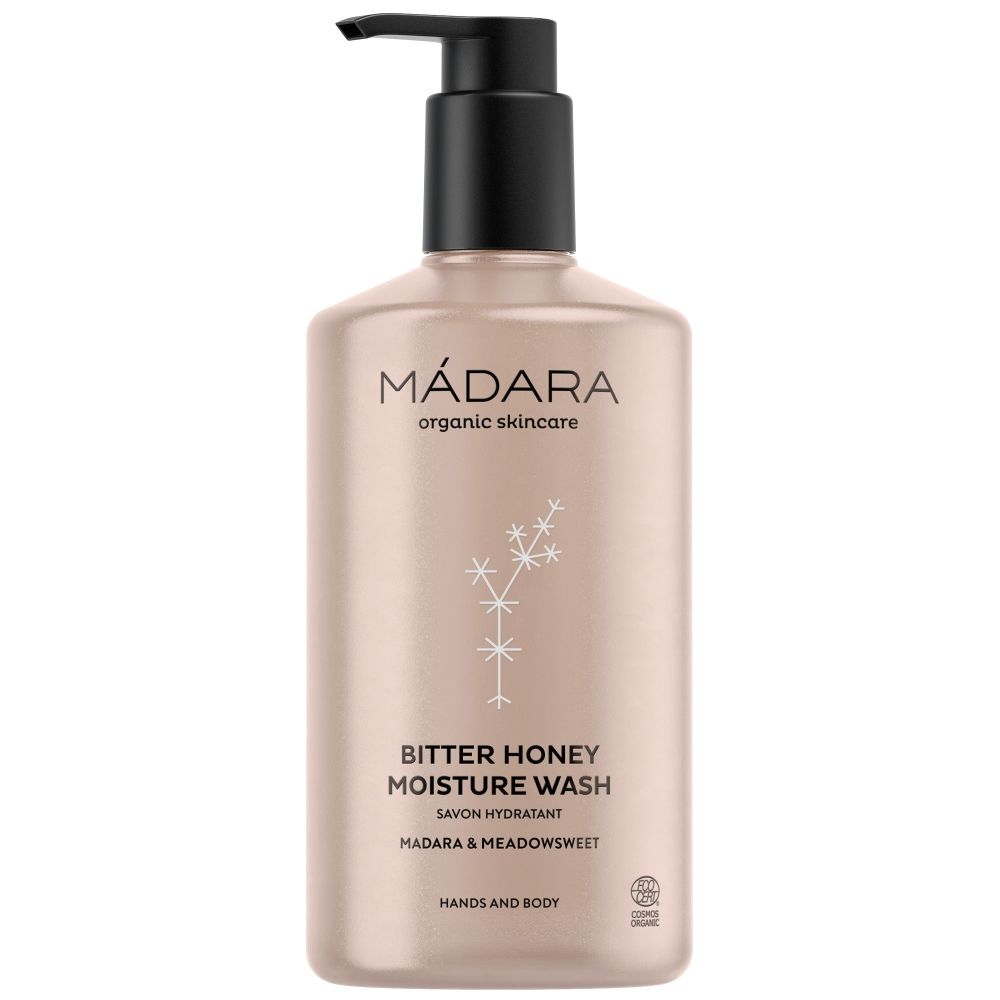 Beige Flüssigseife mit schwarzem Pumpverschluss. Aufschrift: MÁDARA, BITTER HONEY MOISTURE WASH, Hände und Körper. Bio-Siegel.