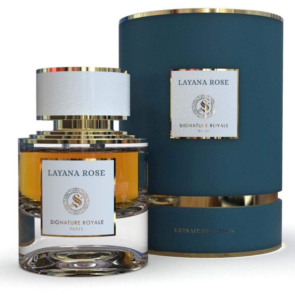 Parfümflakon und Verpackung. Flakon mit goldfarbenen Elementen und weißem Deckel. Blaue Verpackung mit goldenen Akzenten und Produktnamen.