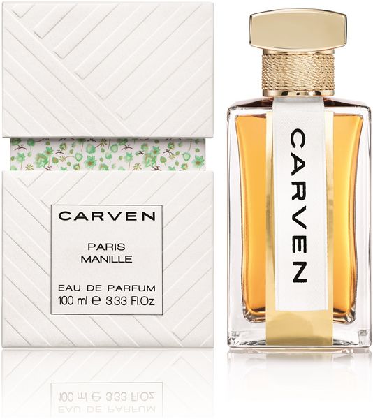 Parfümflakon und Verpackung. Flakon mit goldfarbenem Verschluss, weißem Etikett mit Markenschriftzug. Verpackung mit Markenschriftzug.