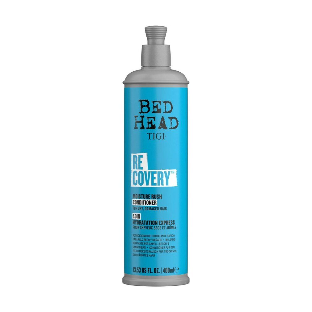 Flasche mit blauem Etikett. Aufschrift: Bed Head, TIGI, Recovery. Feuchtigkeitspflege für trockenes, strapaziertes Haar. 400ml.