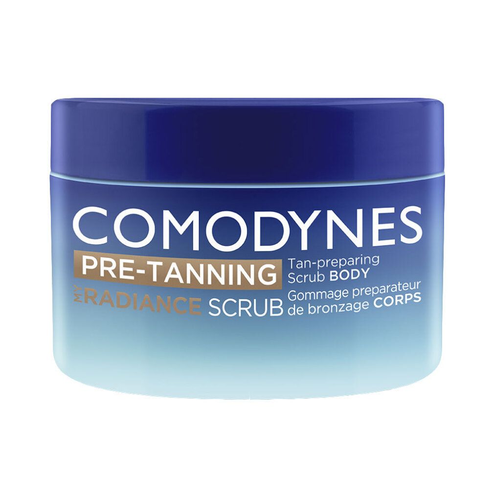 Blau-weißer Tiegel. Produktname: COMODYNES PRE-TANNING RADIANCE SCRUB BODY. Text auf dem Etikett.