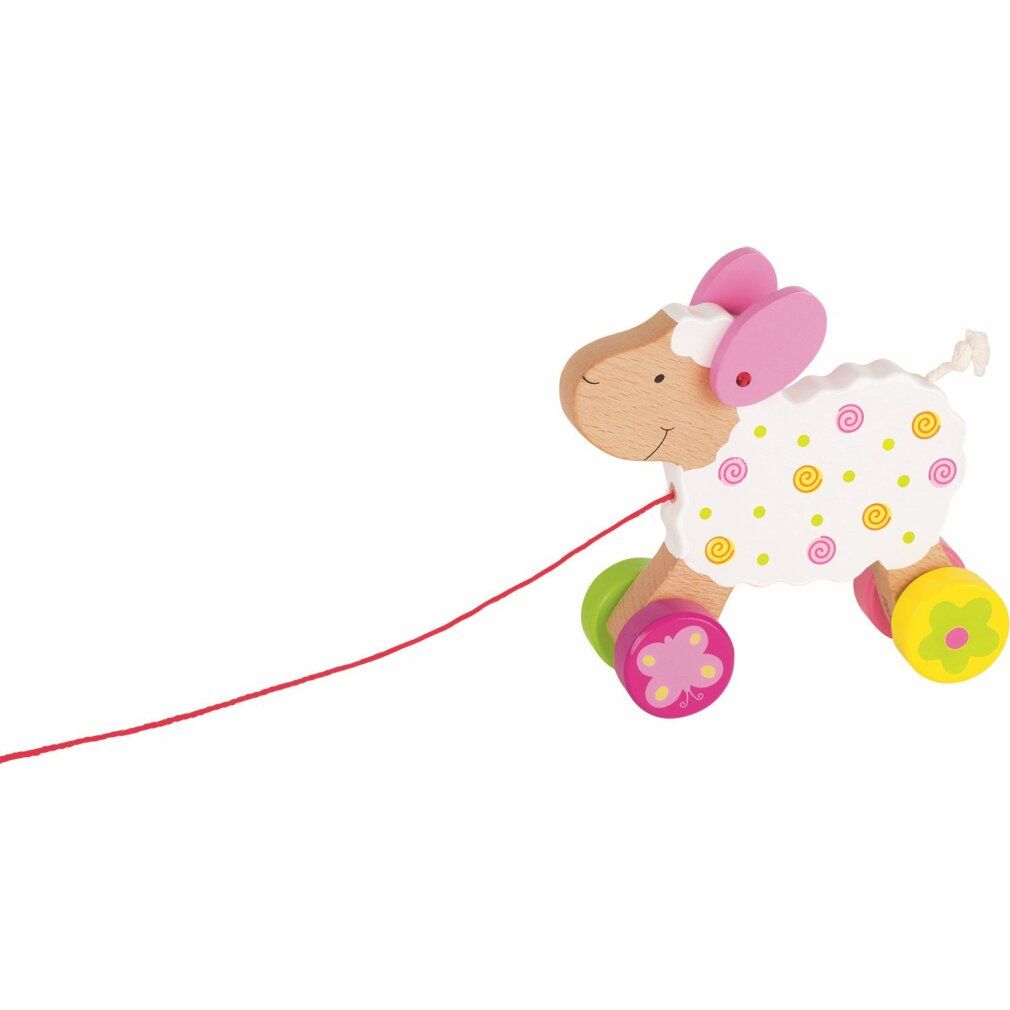 Holzschaf mit Rädern und roter Schnur. Weißes Fell mit gelben und rosa Punkten. Rosa Ohren und Räder mit Blumenmuster.