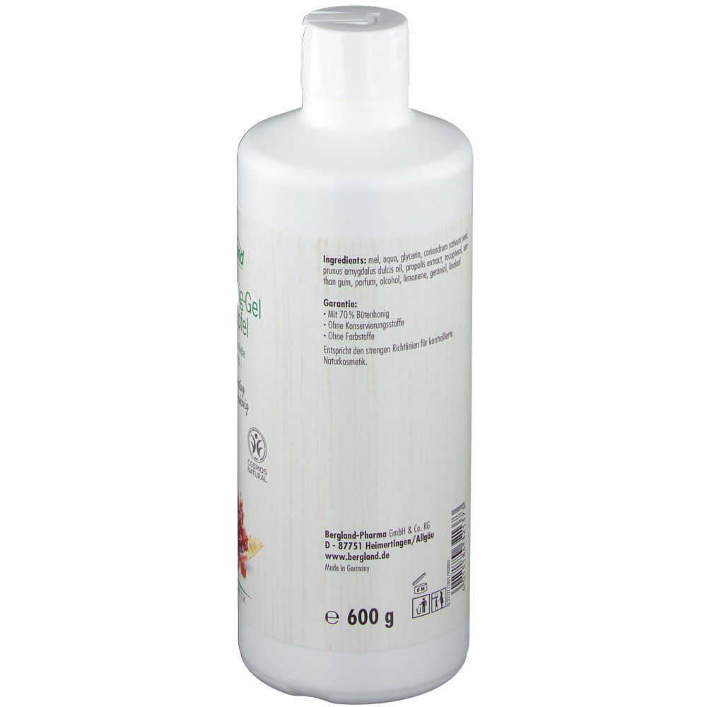 Weiße Flasche mit Schraubverschluss. Aufkleber mit Inhaltsstoffen und Text. Unten links ein Logo mit Granatapfel-Motiv. Gewicht: 600 g.