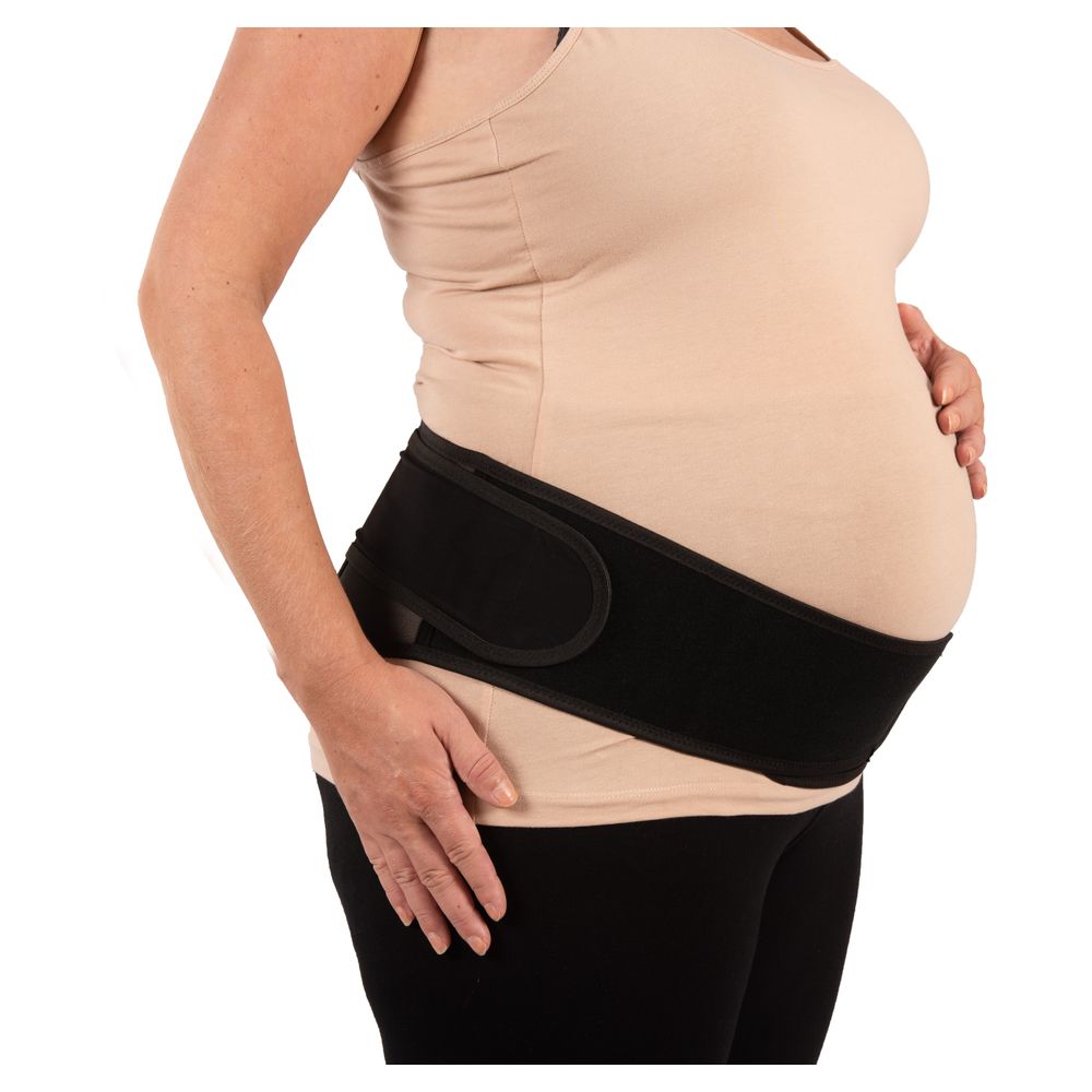Schwarzes Bauchband am Bauch einer schwangeren Frau. Klettverschluss.