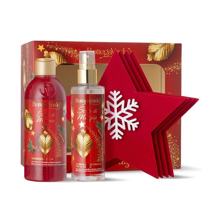 Confezione regalo Bottega Verde 'Scie di magia', con due flaconi e una stella rossa. I flaconi contengono bagnoschiuma e acqua profumata. La confezione è rossa con dettagli dorati e il nome del marchio.