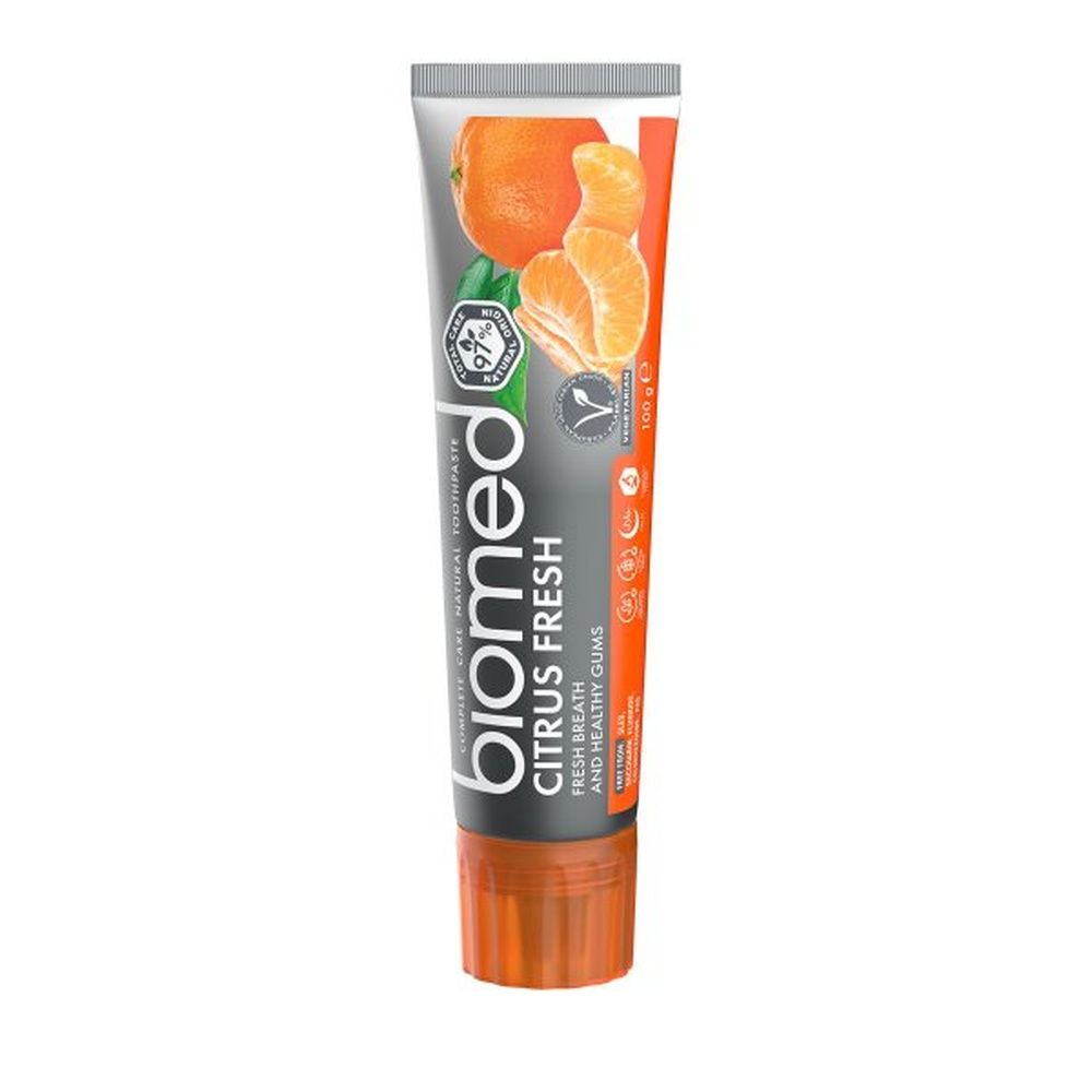 Zahnpasta-Tube mit Biomed-Logo und Citrus Fresh-Aufdruck. Abbildung von Mandarinen. Orangefarbener Verschluss.