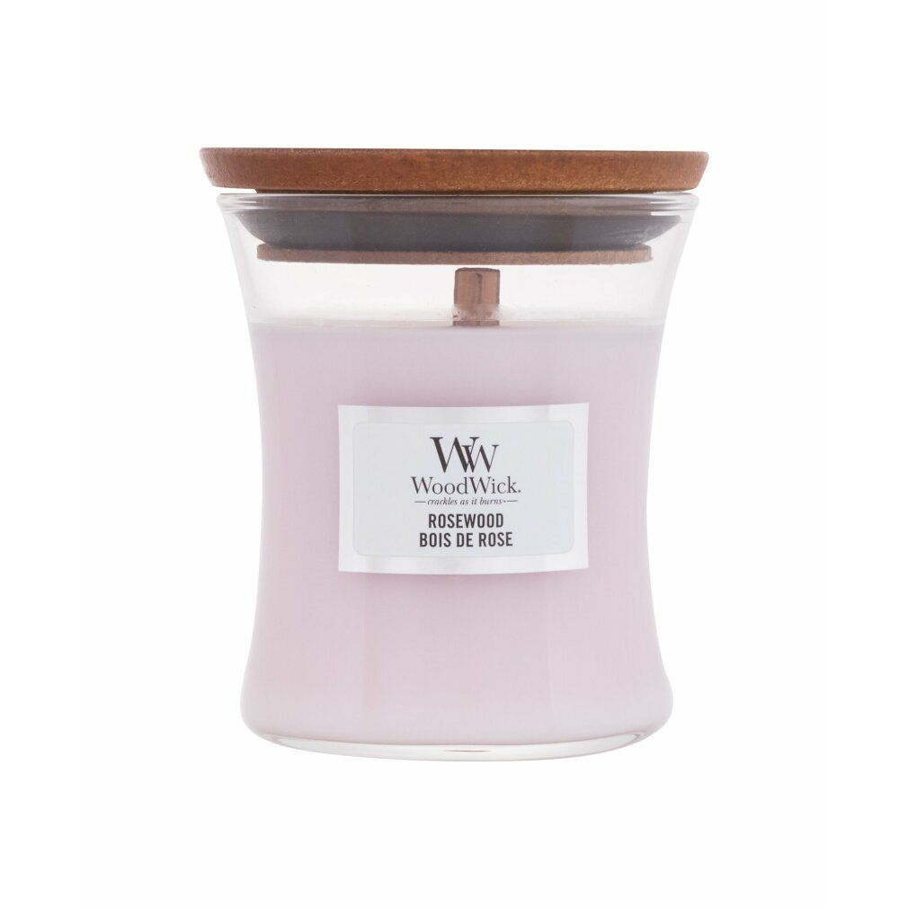 Sanduhrförmige Kerze mit Holzdocht. Rosa Wachs in Glasbehälter. Label mit Logo und 'Rosewood Bois de Rose'. Holzdeckel.