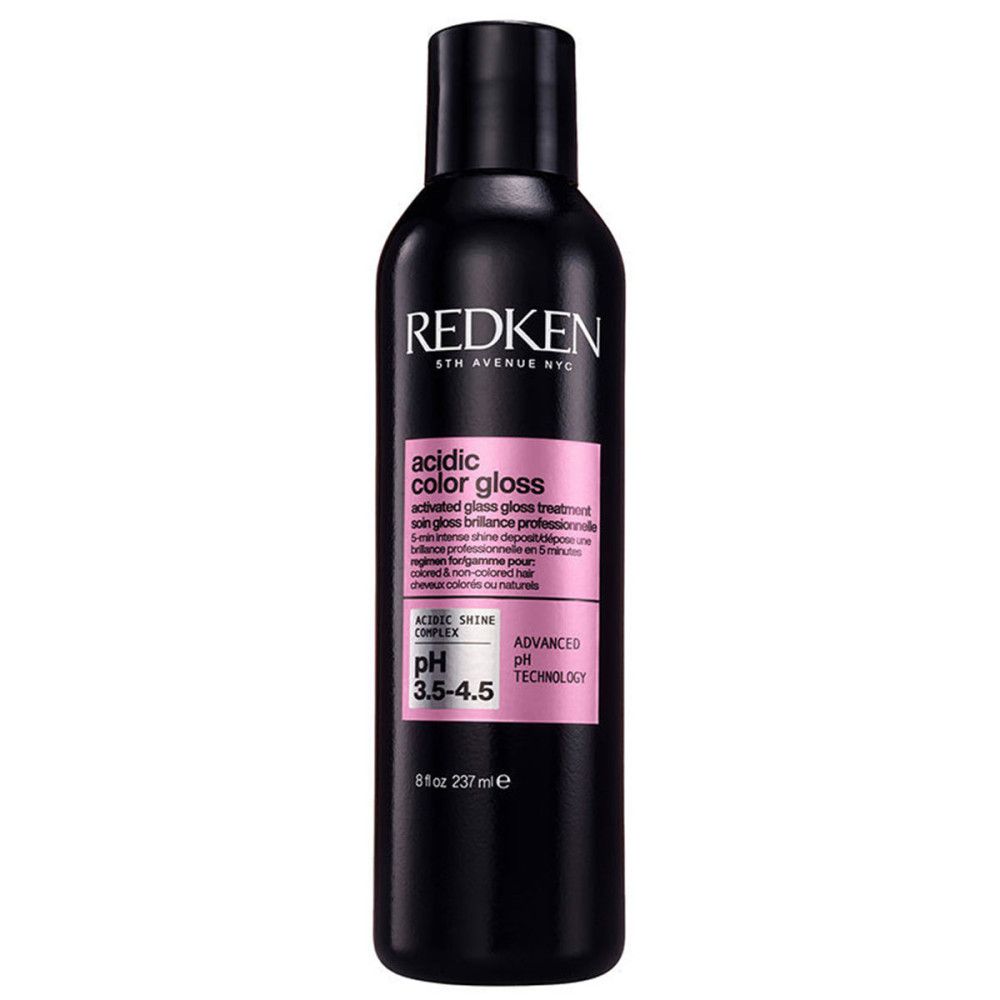 Schwarze Flasche mit rosa Etikett. Marke: Redken. Produktname und pH-Wert 3.5-4.5. 237ml.