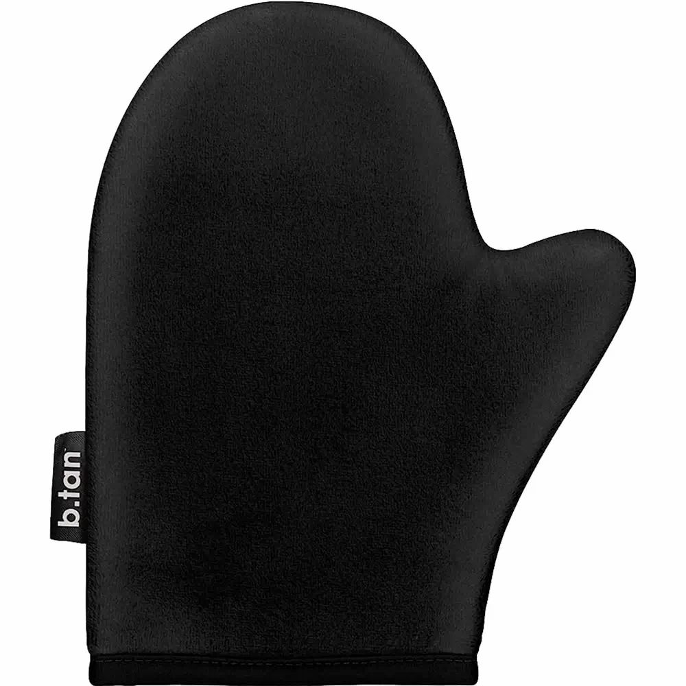 Schwarzer Selbstbräuner-Handschuh. Marke: b.tan. Form: Handschuh mit Daumenöffnung. Material: Stoff.