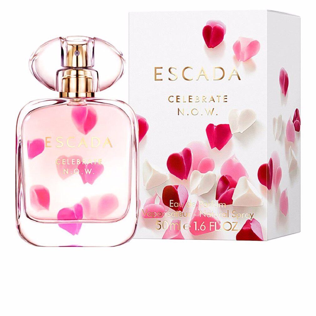 Parfümflakon und Verpackung. Flakon mit rosa Flüssigkeit und Blütenblättern. Verpackung mit Aufschrift: ESCADA CELEBRATE N.O.W.