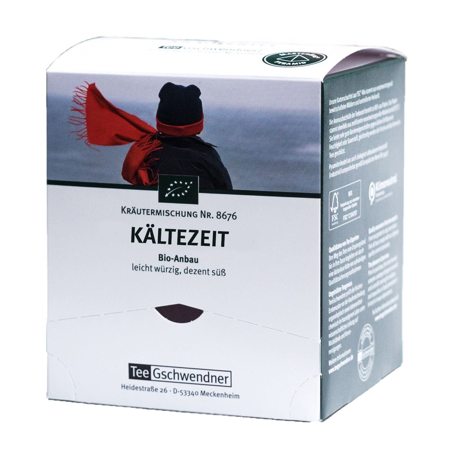 Kartonverpackung mit Aufdruck. Zeigt eine Person mit rotem Schal und schwarzer Mütze. Text: Kältezeit, Bio-Anbau, Tee Gschwendner.