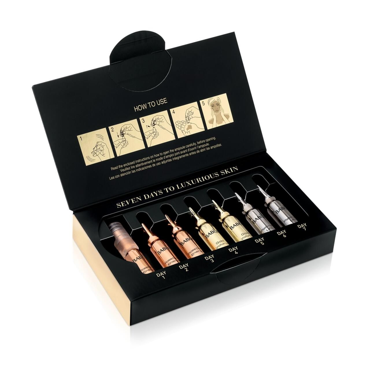 Geöffnete schwarze Schachtel mit sieben Ampullen. Aufschrift: Seven Days to Luxurious Skin. Ampullen in verschiedenen Farben.