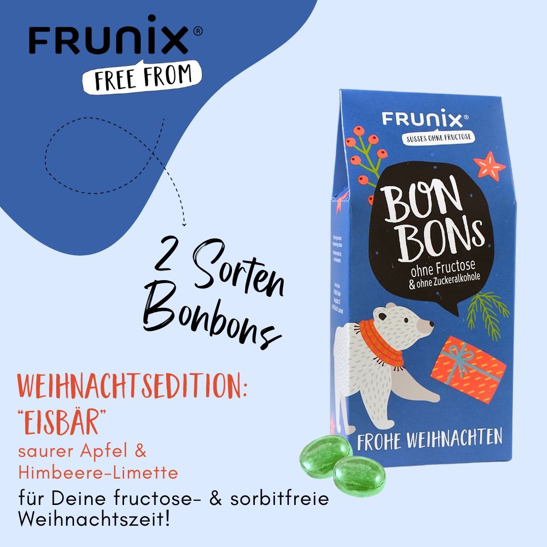 Bonbons-Packung mit Eisbär-Illustration. Text: "Frohe Weihnachten", "2 Sorten Bonbons", "ohne Fructose & ohne Zuckeralkohole". Zwei grüne Bonbons.
