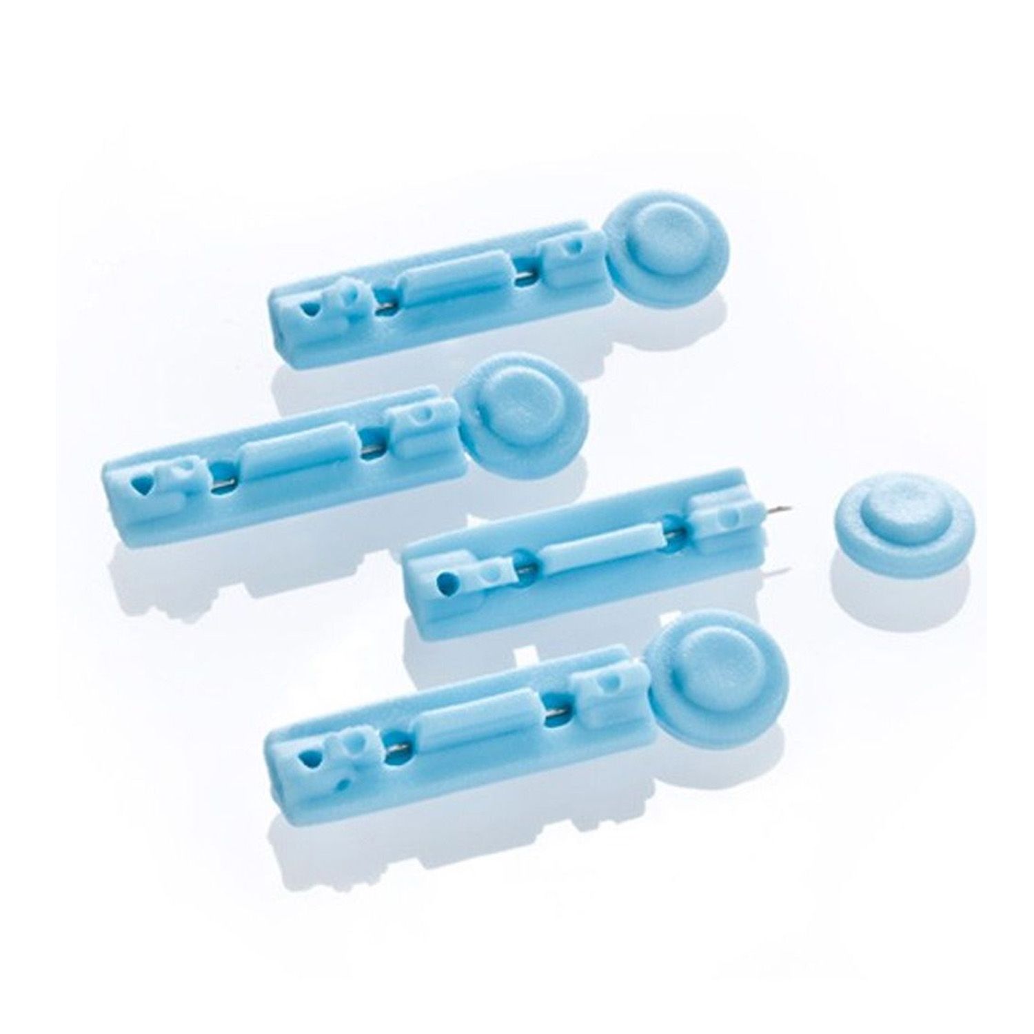 Quatre lancettes bleues avec capuchons ronds. Un capuchon séparé.