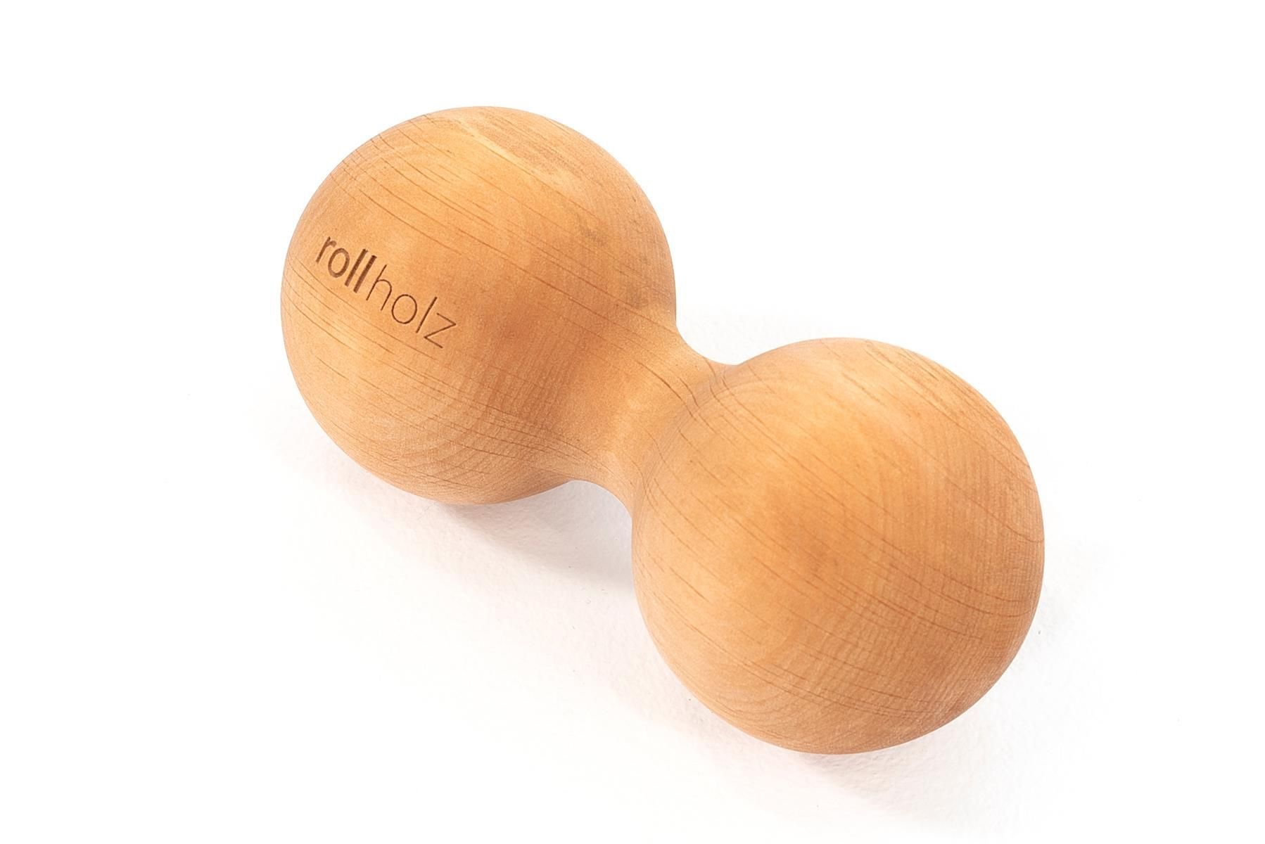 Doppelkugel aus Holz. Zwei Kugeln, verbunden durch einen Steg. Auf einer Kugel steht "rollholz".