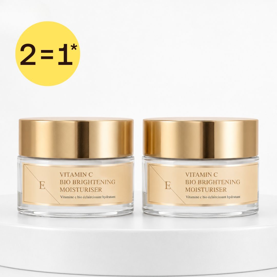 Zwei Glasbehälter mit ErthSkin London Vitamin C Bio Brightening Moisturizer. Goldene Deckel, Etiketten mit Produktnamen.